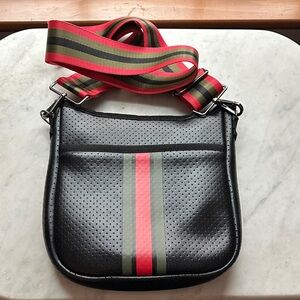 HAUTE SHORE Black Crossbody Bag with Red and Green Stripes